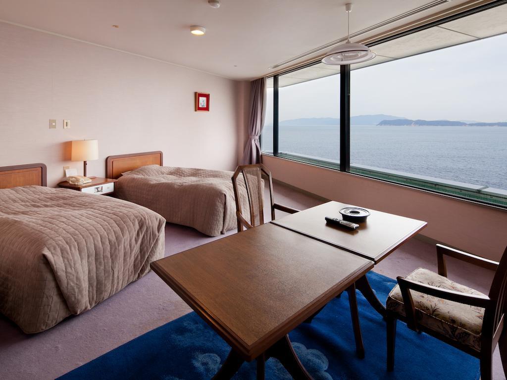 Отель Wakayama Kada Onsen Kada Kaigetsu Номер фото